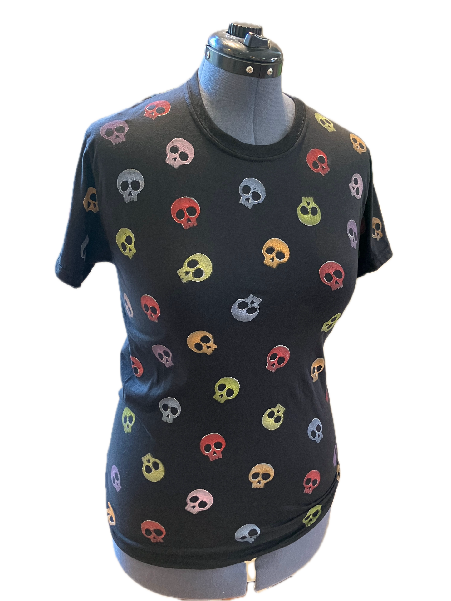 Black T with multi colored skulls